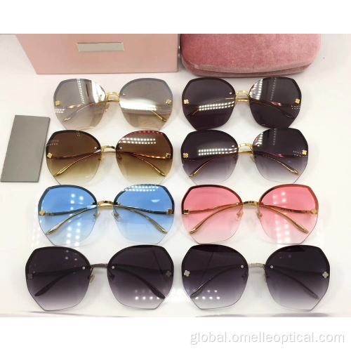 Rose Gold Rimless Sunglasses Reflective Rimless Sunglasses for Female Supplier